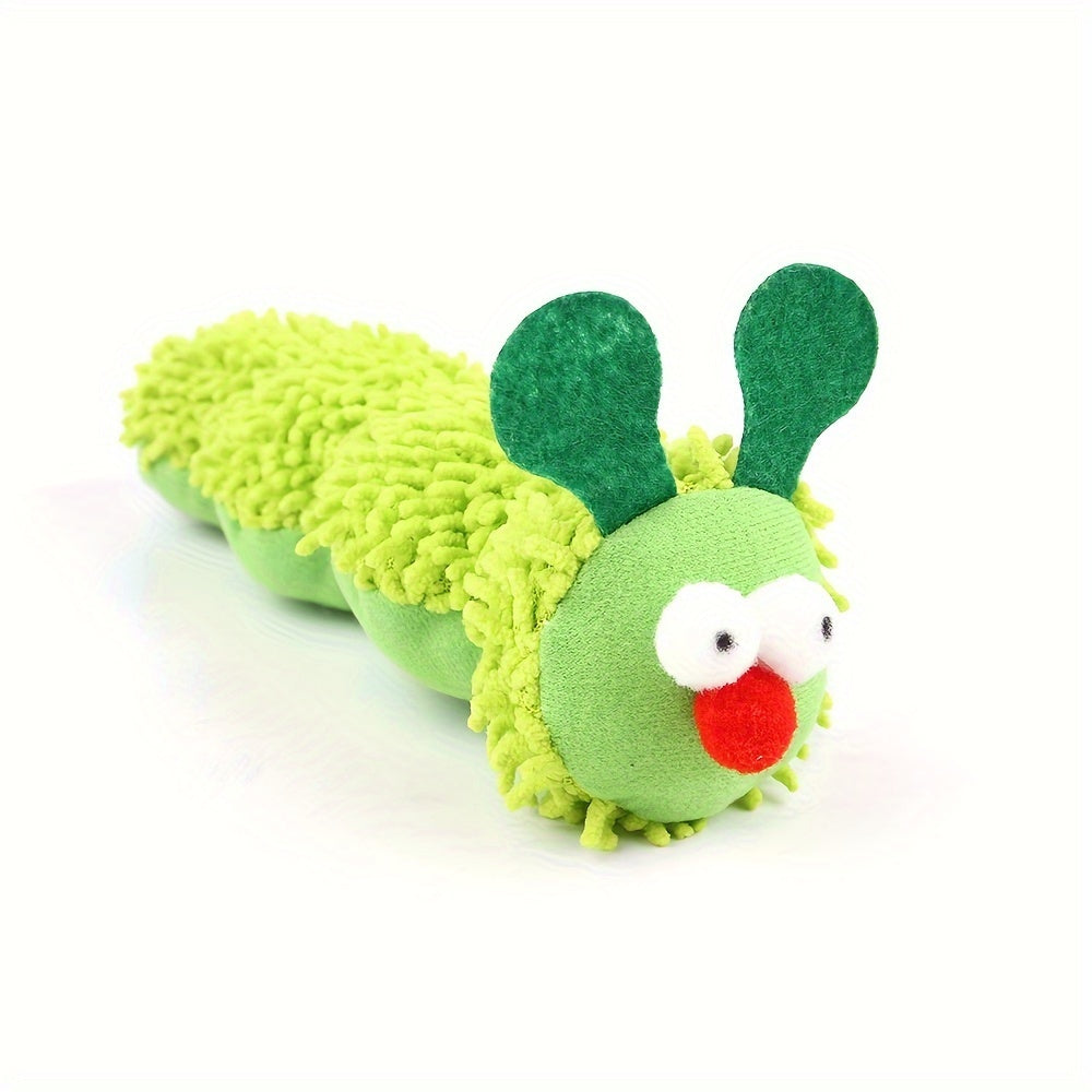 Close-up of green caterpillar plush cat toy with red nose and big eyes